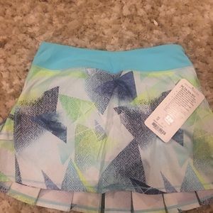 NWT set the pace skirt size 14. Ivivva